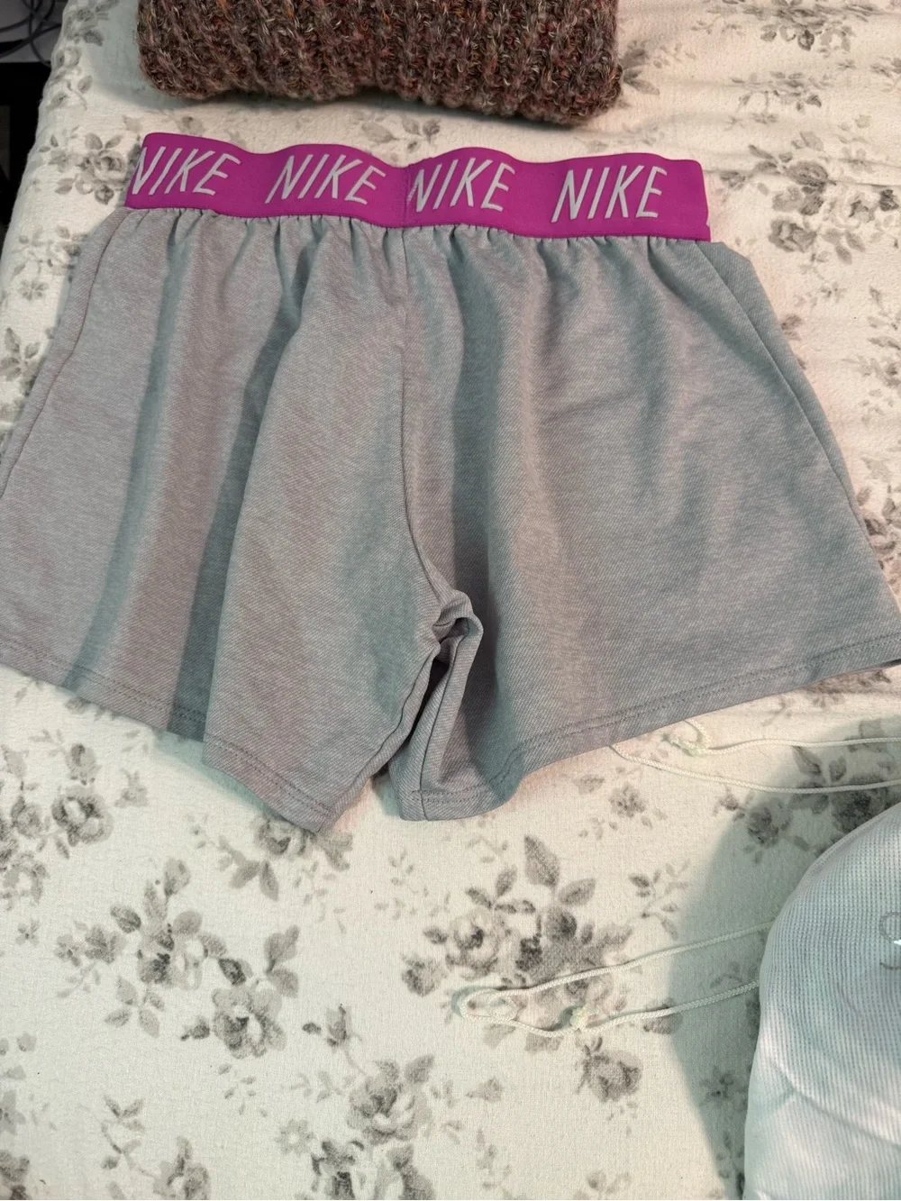 Nike Gray Athletic Shorts with Pink Waistband and Swoosh